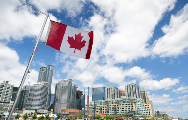 cityscape with canadian flag